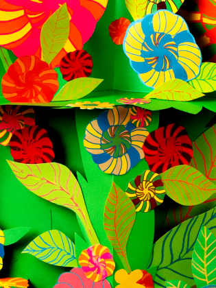 Ett mönster i former av blommor och blad i olika färger. 