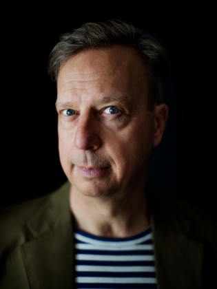 Porträttfoto på författaren Torbjörn Flygt. 